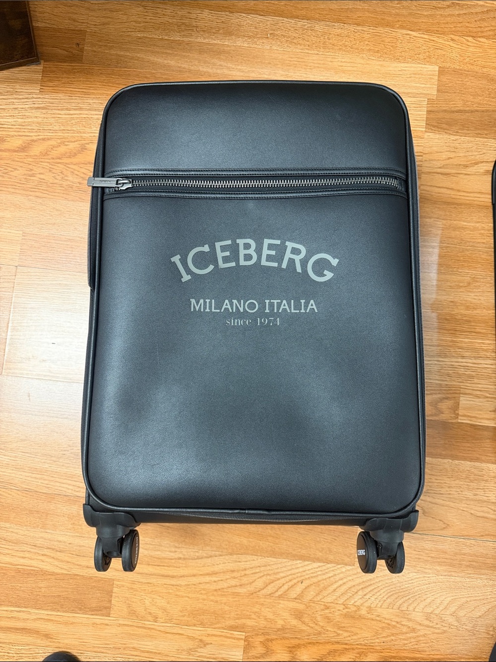 Iceberg Black Spinner Carry-On with Front Zip Pocket